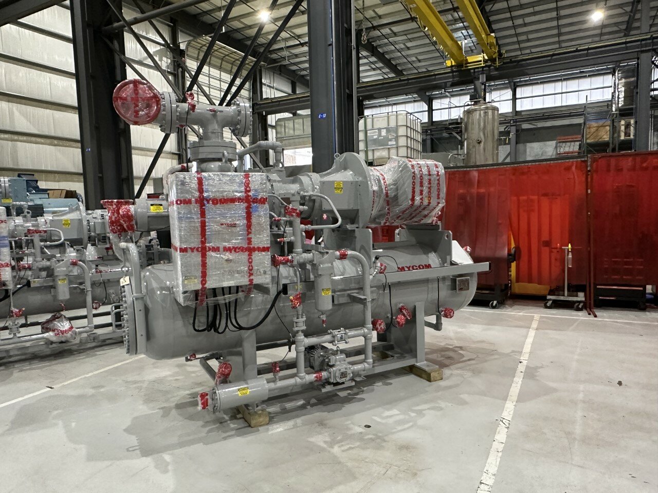 A recently-made compressor, made at the Katy Mayekawa plant, is wrapped and ready for shipment. The company manufactures compressors that serve the food, medical and oil and gas industries.